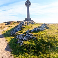 Buy canvas prints of Celtic cross on Llanddwyn Island,  by Kevin Hellon