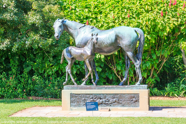 Mare and foal statue. Picture Board by Kevin Hellon