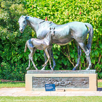 Buy canvas prints of Mare and foal statue. by Kevin Hellon