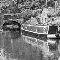Buy canvas prints of Barge moored next to a bridge by Kevin Hellon