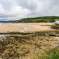 Buy canvas prints of Benllech beach on a cloudy day by Kevin Hellon