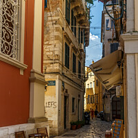 Buy canvas prints of Narrow street in Corfu Town by Kevin Hellon