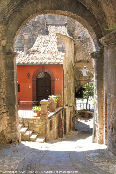 Narrow street in Narni Picture Board by Kevin Hellon