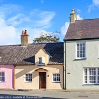 Buy canvas prints of Colourful houses in Church Street,  by Kevin Hellon
