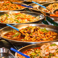 Buy canvas prints of Platters of Thai food on a street food stall by Kevin Hellon