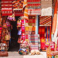 Buy canvas prints of Carpet shop in the old town by Kevin Hellon