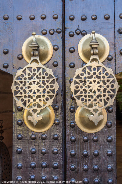 Ornate brass doorknockers Picture Board by Kevin Hellon