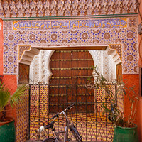 Buy canvas prints of Moroccan doorway and bicycle by Kevin Hellon