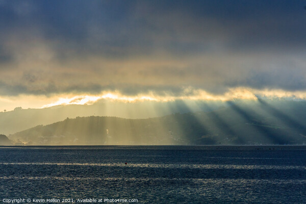 Sun rays and rainstorms on the Otago Peninsular Picture Board by Kevin Hellon