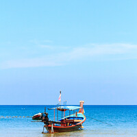 Buy canvas prints of Long tail boat, tropical beach by Kevin Hellon