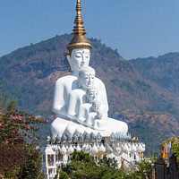 Buy canvas prints of Five white Buddha statues by Kevin Hellon