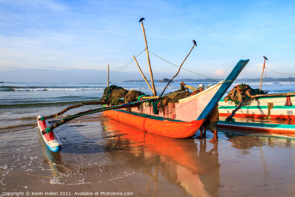 Traditional fishing boat on beach Picture Board by Kevin Hellon
