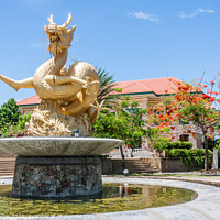 Buy canvas prints of Naga statue and fountain by Kevin Hellon