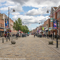 Buy canvas prints of View down the High Street, High Wycombe by Kevin Hellon