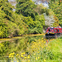 Buy canvas prints of A narrowboat makes its way along the Grand Union canal  by Kevin Hellon