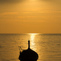 Buy canvas prints of Silhouettes of boats at Bang Tao beach by Kevin Hellon