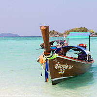 Buy canvas prints of Long Tail boat at anchor, Koh Lipe by Kevin Hellon