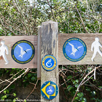 Buy canvas prints of Signpost on the Isle of Anglesey coastal path, Wal by Kevin Hellon