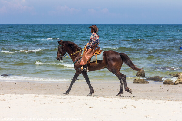 Horse and rider, Hua Hin beach, Thailand Picture Board by Kevin Hellon