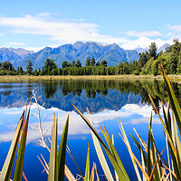 Buy canvas prints of Mountain reflections in Lake Matheson by Kevin Hellon