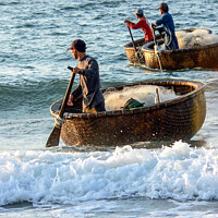 Buy canvas prints of Fishermen returning in their coracles by Kevin Hellon