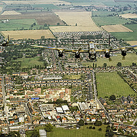 Buy canvas prints of BBMF Lancaster and Hurricane over Bourne, Lincs, 1 by Colin Smedley