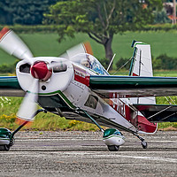 Buy canvas prints of Extra EA230 G-XTRA by Colin Smedley