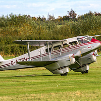 Buy canvas prints of DH89A Dragon Rapide 6 G-AGSH  by Colin Smedley