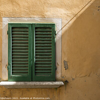 Buy canvas prints of Green shutters and a yellow concrete wall in Italy by Steven Dijkshoorn