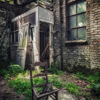 Buy canvas prints of A lonely chair in an abandoned factory in Belgium by Steven Dijkshoorn