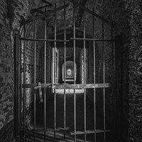 Buy canvas prints of Black and white abandoned prison door by Steven Dijkshoorn