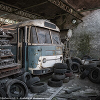 Buy canvas prints of An old blue bus with tires surrounded by Steven Dijkshoorn