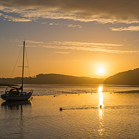 Buy canvas prints of Sunrise at St Germans quay , with golden sky by stephen tolley