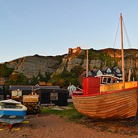 Buy canvas prints of Hastings Fishing fleet at Sunset by Lee Sulsh