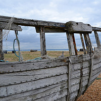 Buy canvas prints of Abandoned boat at Dungeness in colour by Lee Sulsh