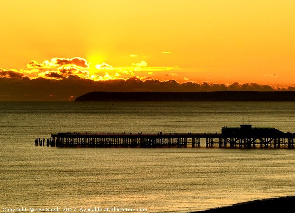 Hastings Pier at sunset Picture Board by Lee Sulsh