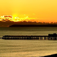 Buy canvas prints of Hastings Pier at sunset by Lee Sulsh