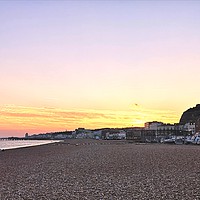 Buy canvas prints of Hastings Beach at Sunset by Lee Sulsh