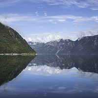 Buy canvas prints of reflection of the mountains in fjord in norway by Chris Willemsen