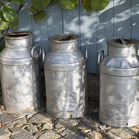 Buy canvas prints of three churns on a farm by Chris Willemsen