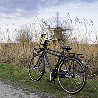 Buy canvas prints of old type of bike and windmill by Chris Willemsen