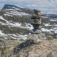 Buy canvas prints of balanced stack of stones at dalsnibba by Chris Willemsen