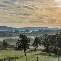 Buy canvas prints of sunrise in the hills of belgium with mist by Chris Willemsen