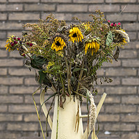 Buy canvas prints of bouquet of dry flowers in yellow watering can by Chris Willemsen