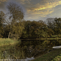 Buy canvas prints of two boats in a pond with autumn colors by Chris Willemsen