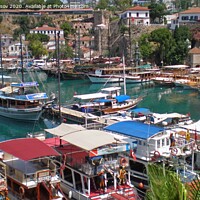 Buy canvas prints of Pleasure  yachts near the port of the old city of Antalya,Turkey by Vitaliy Borisov