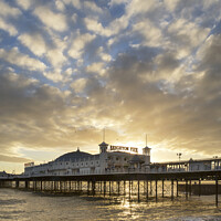 Buy canvas prints of Beautiful Winter sunset landscape of Brighton Pier on the south coast of England by Matthew Gibson