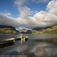 Buy canvas prints of Landscape image of rowing boats on Llyn Nantlle in Snowdonia at sunset by Matthew Gibson