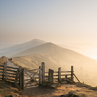 Buy canvas prints of Stunning Winter sunrise landscape image of The Great Ridge in the Peak District in England with a cloud inversion and mist in the Hope Valley with a lovely orange glow by Matthew Gibson