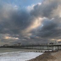 Buy canvas prints of Beautiful long exposure sunset landscape image of pier at sea in Worthing England by Matthew Gibson
